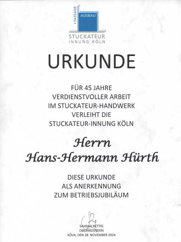 Hans-Hermann Hürth erhält Urkunde zum Betreibsjubiläum